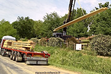 déchargement d'une maison en bois en kit